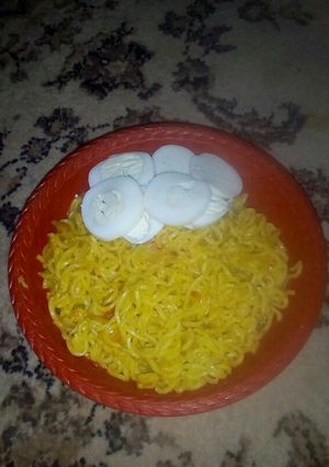 A picture of Indomie with boiled egg.