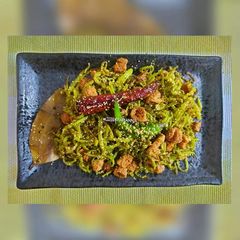 A picture of Lau Khosha Chechki/Bottlegourd Peel Stir fry.