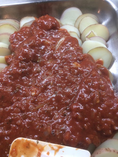Una foto de Papas a la pizza