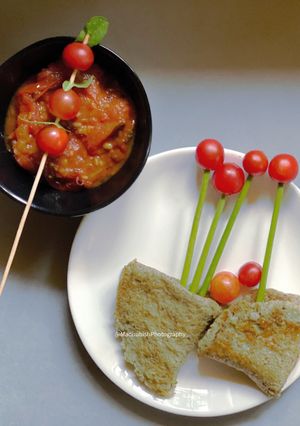 A picture of Pesarattu with tangy, spicy Thokku.
