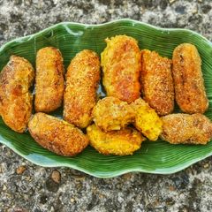 A picture of Pumpkin, sweet-potato and sweetcorn nibbles in breadcrumbs.