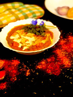 A picture of Matar Paneer in tomato gravy.