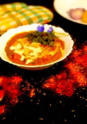 A picture of Matar Paneer in tomato gravy.