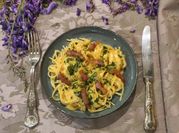 Una foto di carbonara con guanciale