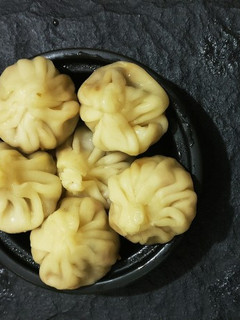 A picture of Paneer, cabbage, Momo's.