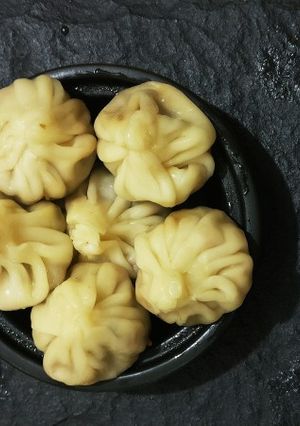 A picture of Paneer, cabbage, Momo's.