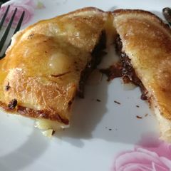 A picture of Nutella stuffed Pan Cake 🥞.