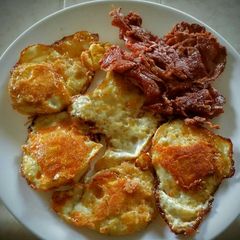 A picture of Cheese-Fried Bacon and Eggs.