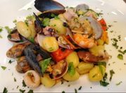 Una foto di gnocchi cozze