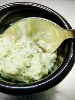 A picture of Cilantro and roasted peanut sauce.