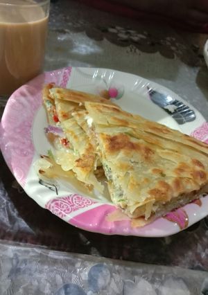 A picture of Double Decker Cheese Anda Paratha 🧀🍳.