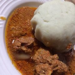 A picture of Pounded yam with egusi soup.