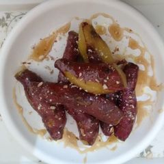 A picture of Liquid caramel sweet potatoes (shakkar kand).