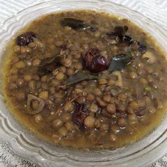 A picture of Kali Masoor(black lentils),With Baghray Howay Chawal.