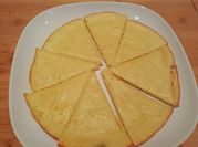 Una foto de faina de queso