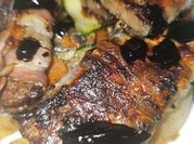 Una foto de filete con tocino