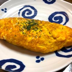 A picture of Japanese Egg wrapped Fried Noodle(Omu Yakisoba).