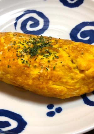 A picture of Japanese Egg wrapped Fried Noodle(Omu Yakisoba).