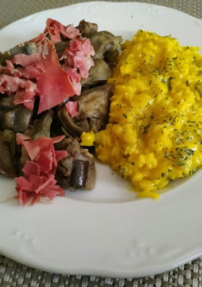 Una foto de Alcachofas con jamón y arroz a la milanesa