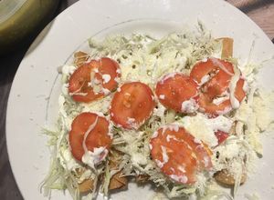 Una foto de Flautas de pollo