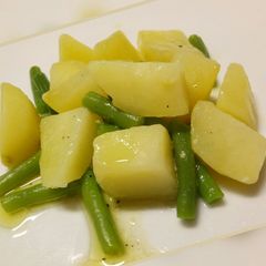 A picture of Warm potato and green bean salad with Dijon mustard dressing.