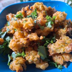 A picture of Leftover rice and onion pakoda.