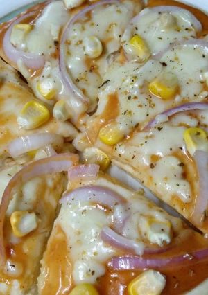 A picture of Corn pizza 🍕.