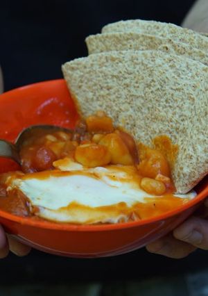 A picture of Chorizo, Gnocchi, baked beans and egg one pot family feast.