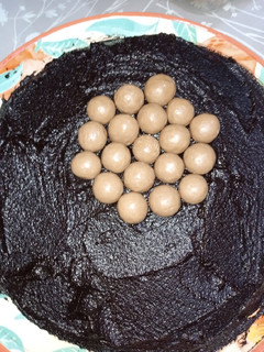A picture of Moist Chocolate Cake With Creamy Chocolate Sauce.
