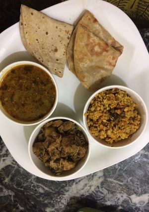 A picture of Methi with soya chunks, lauki ki sabji, dry urad dal platter.