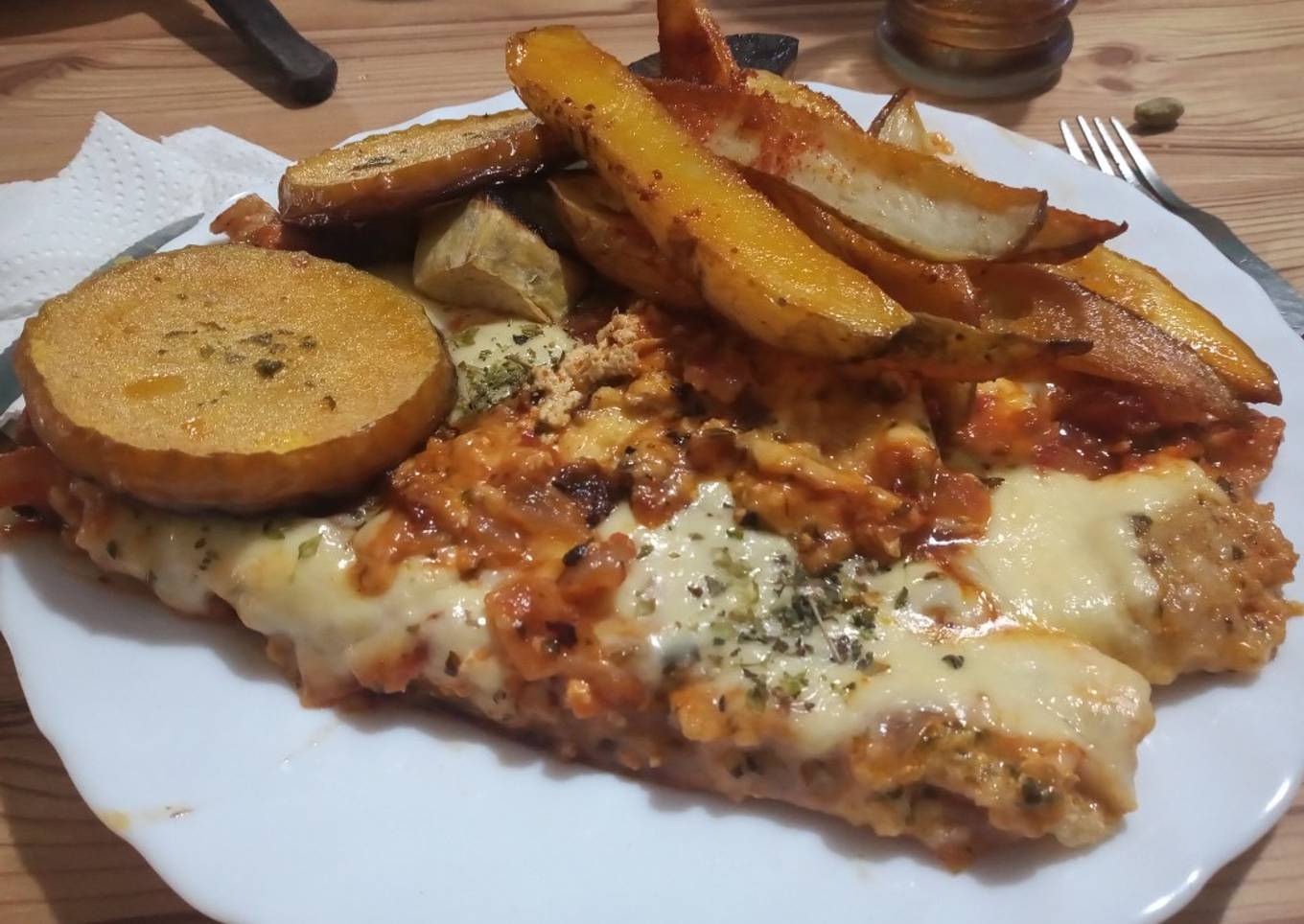Matambre tiernizado a la pizza con papas, zapallo y batatas