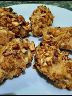 Una foto de Alitas de pollo rebozadas con maíz (kikos)