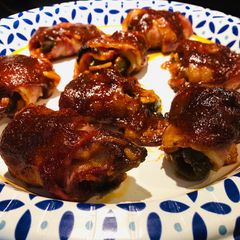 A picture of Bacon 🥓 Wrapped BBQ 🍖 Jalapeño Poppers.