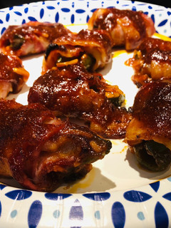 A picture of Bacon 🥓 Wrapped BBQ 🍖 Jalapeño Poppers.