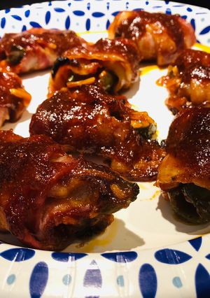 A picture of Bacon 🥓 Wrapped BBQ 🍖 Jalapeño Poppers.