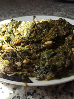 Una foto de Espinacas con pasas y piñones