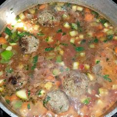 A picture of Albondigas (meatball soup).