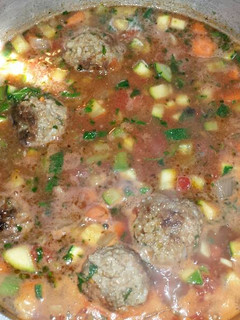 A picture of Albondigas (meatball soup).