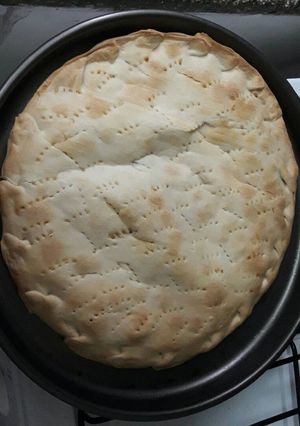 Una foto de Tarta de jamón, queso y cebolla