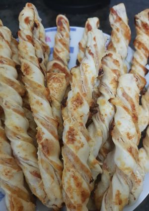Una foto de Bastoncitos de jamón y queso