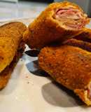 Rollitos de pan de molde con dos tipos de jamón y queso