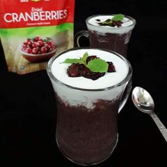 A picture of Black Rice Cranberry Pudding With Cranberry Compote.