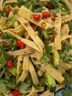 A picture of Chinese Tofu Sheets and Cucumber Salad.