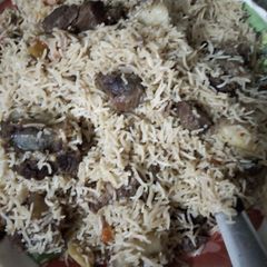 A picture of Beefpulao wih Raita.