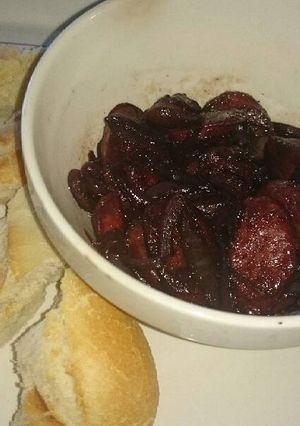 A picture of Chorizo Cooked in Red Wine.