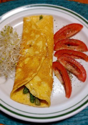 Una foto de Omelette de espárragos con queso