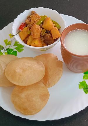 A picture of Kumror chokka (Pumpkin & Poteto Sabji).