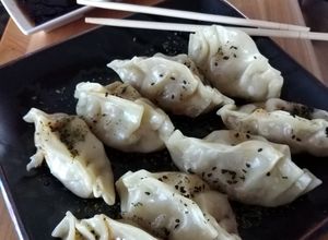 Una foto de Gyozas de cerdo al vapor