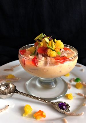A picture of Noodles Custard with Boondi Laddu and jelly.