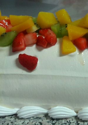 Una foto de Pionono frutado de lúcuma